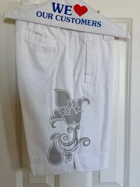 The North Face White Women's Flat-Front Shorts with Gray Floral Graphic Size 4